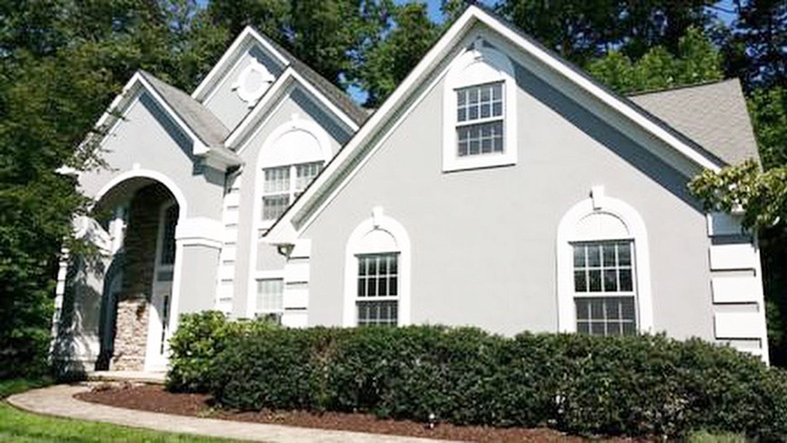Stucco home exterior after painting in New Windsor, NY