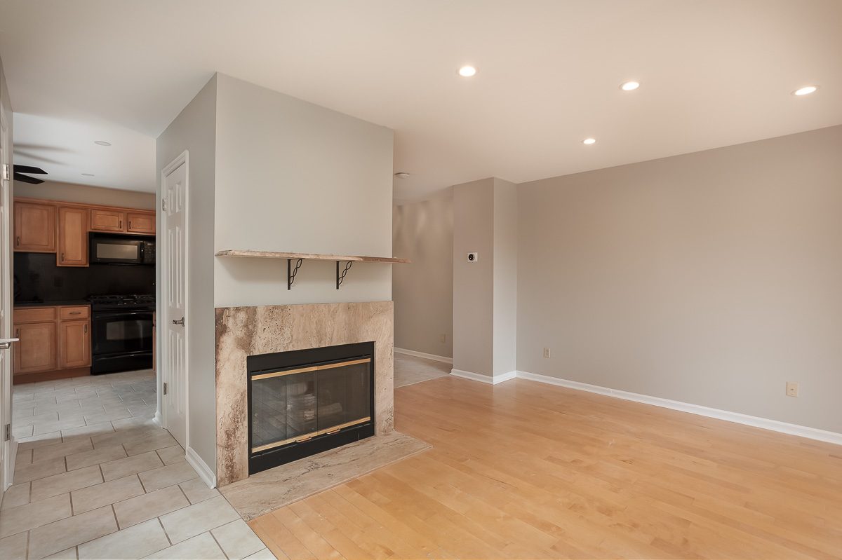 Family room and fireplace surround after painting in Chester, NY