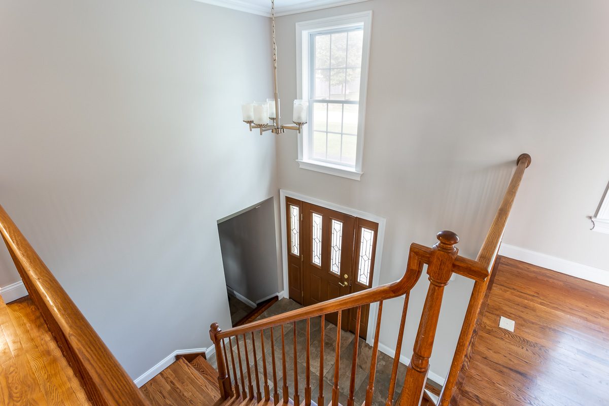 Stair landing, railing and balusters after painting