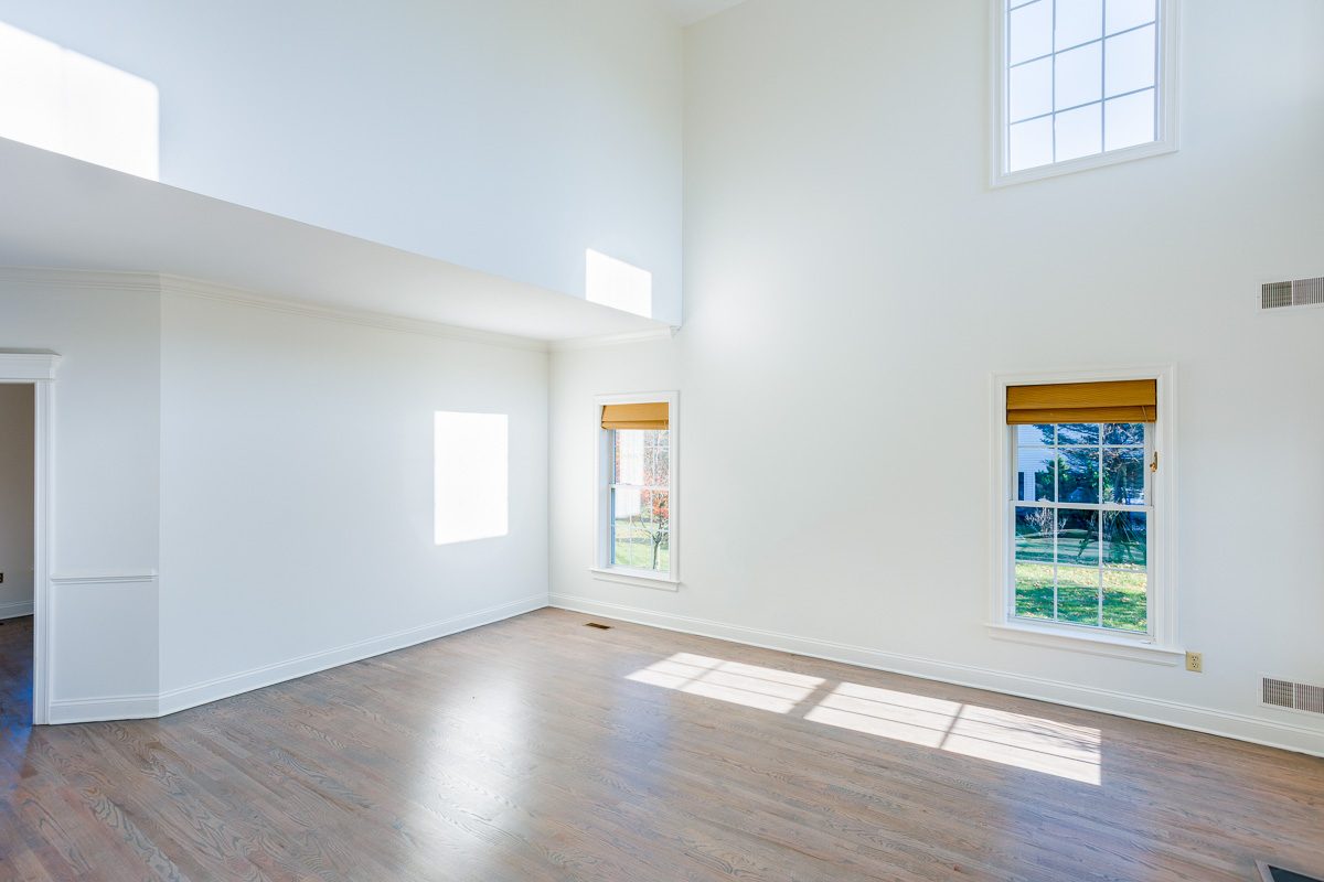 Two-story great room in a Warwick, NY colonial after a full interior repaint